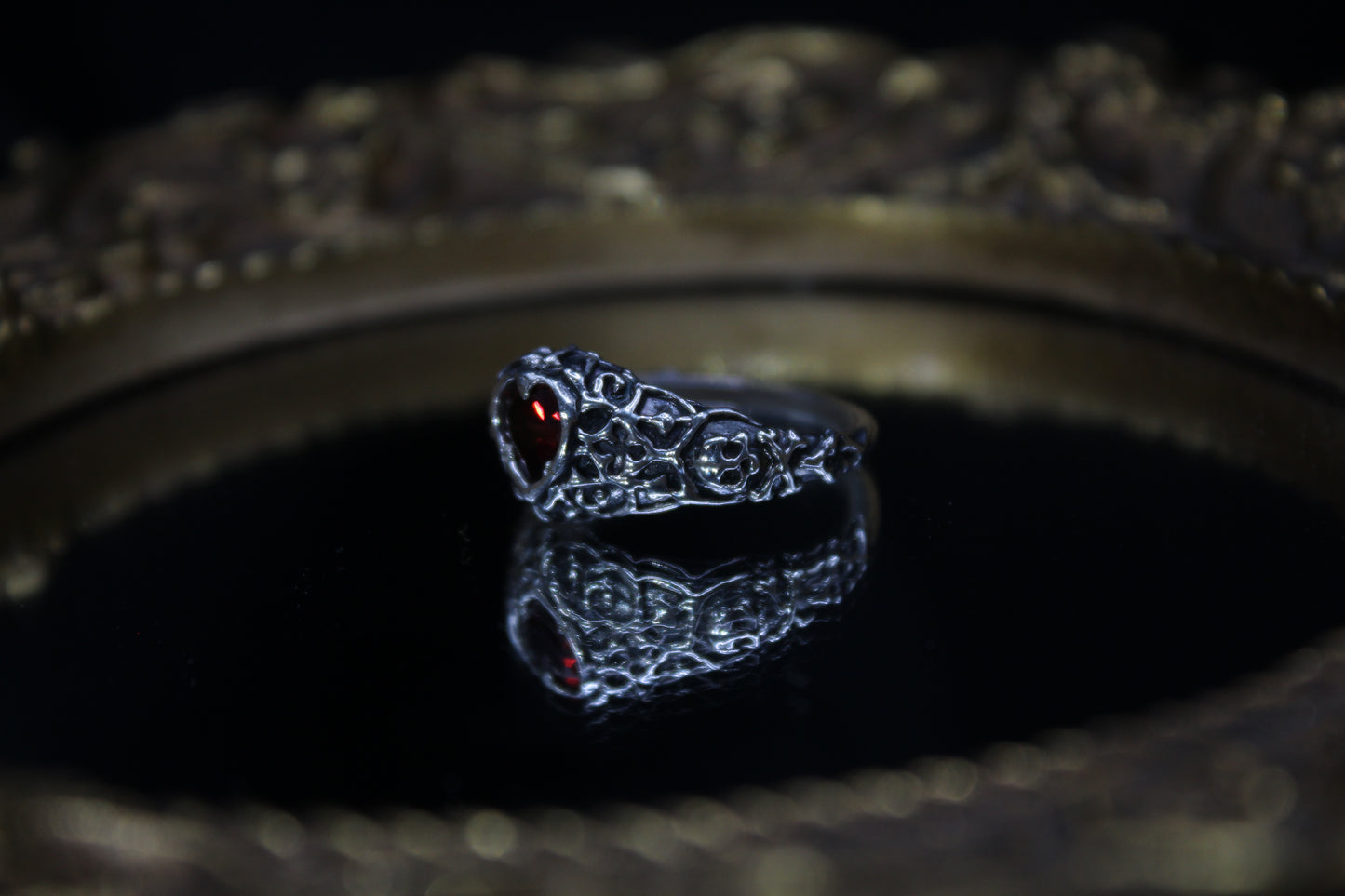 Size 7 1/2 Garnet Shadow Ring