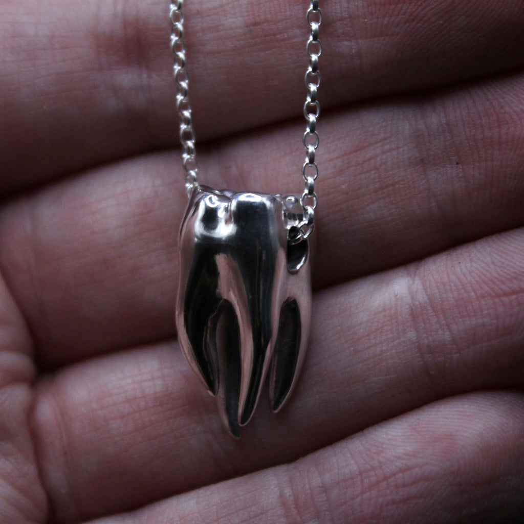 Lucky Silver Tooth