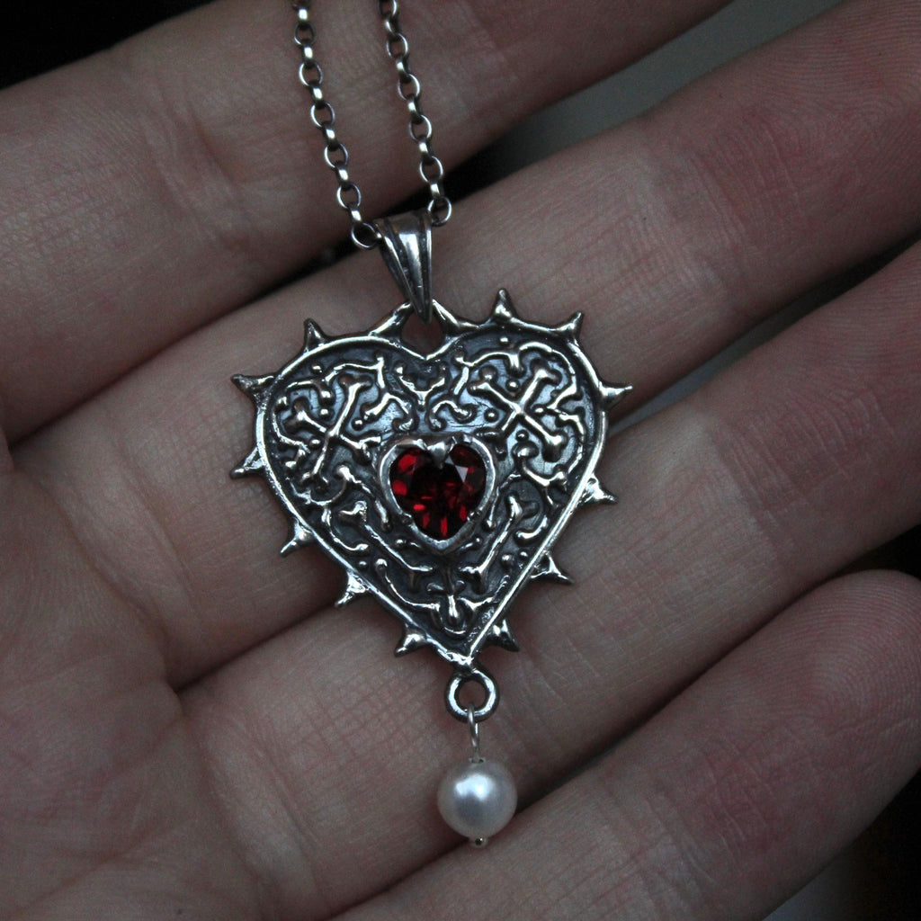 Shadow garnet heart with a pearl drop